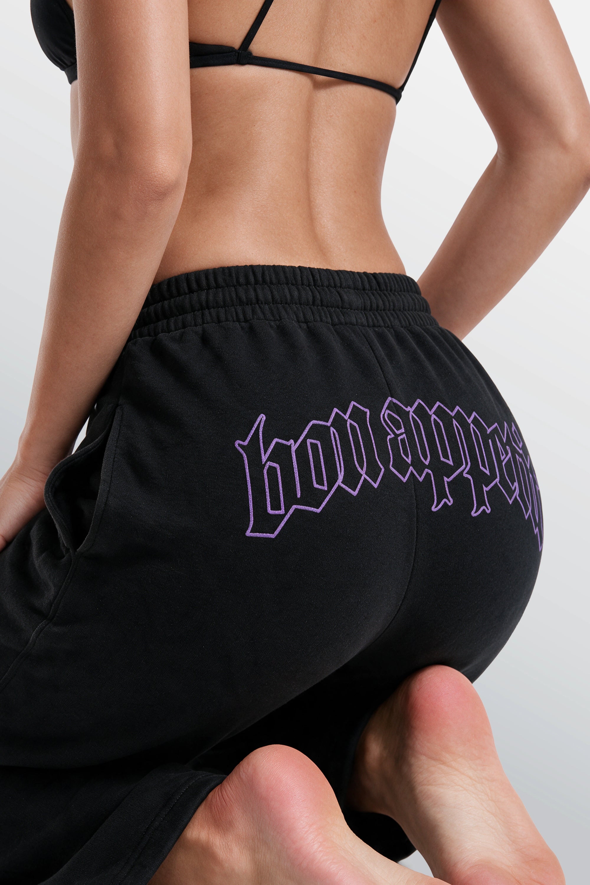 Bon Appetit black loose-fit sweatpants rear artwork on female model